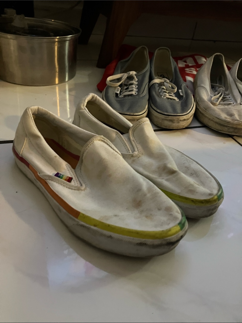 Vans White Slip-On Sneakers with Rainbow Side Stripe